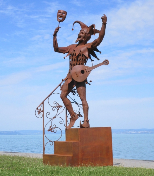 Life size Harlequin iron sculpture